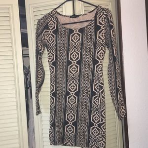 Long sleeve southwestern pattern midi dress.